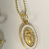 White enamel and gold Mary Medal